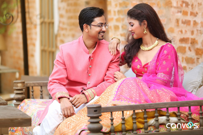 Elegant pre-wedding shoot of Dr. Souvonik Mandal and Dr. Debarati Sarkar in a historic location.