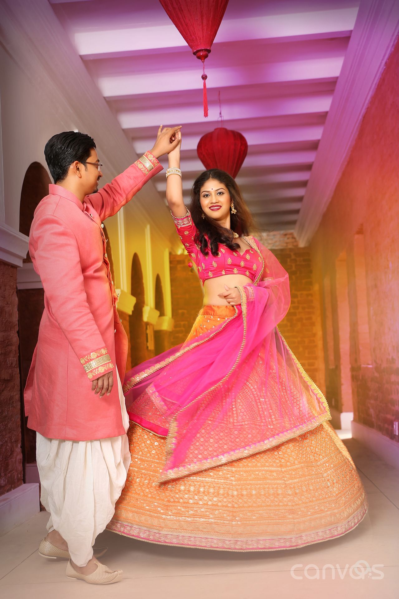 Dr. Souvonik Mandal and Dr. Debarati Sarkar pre-wedding shoot in an elegant ballroom at Bawali Rajbari.