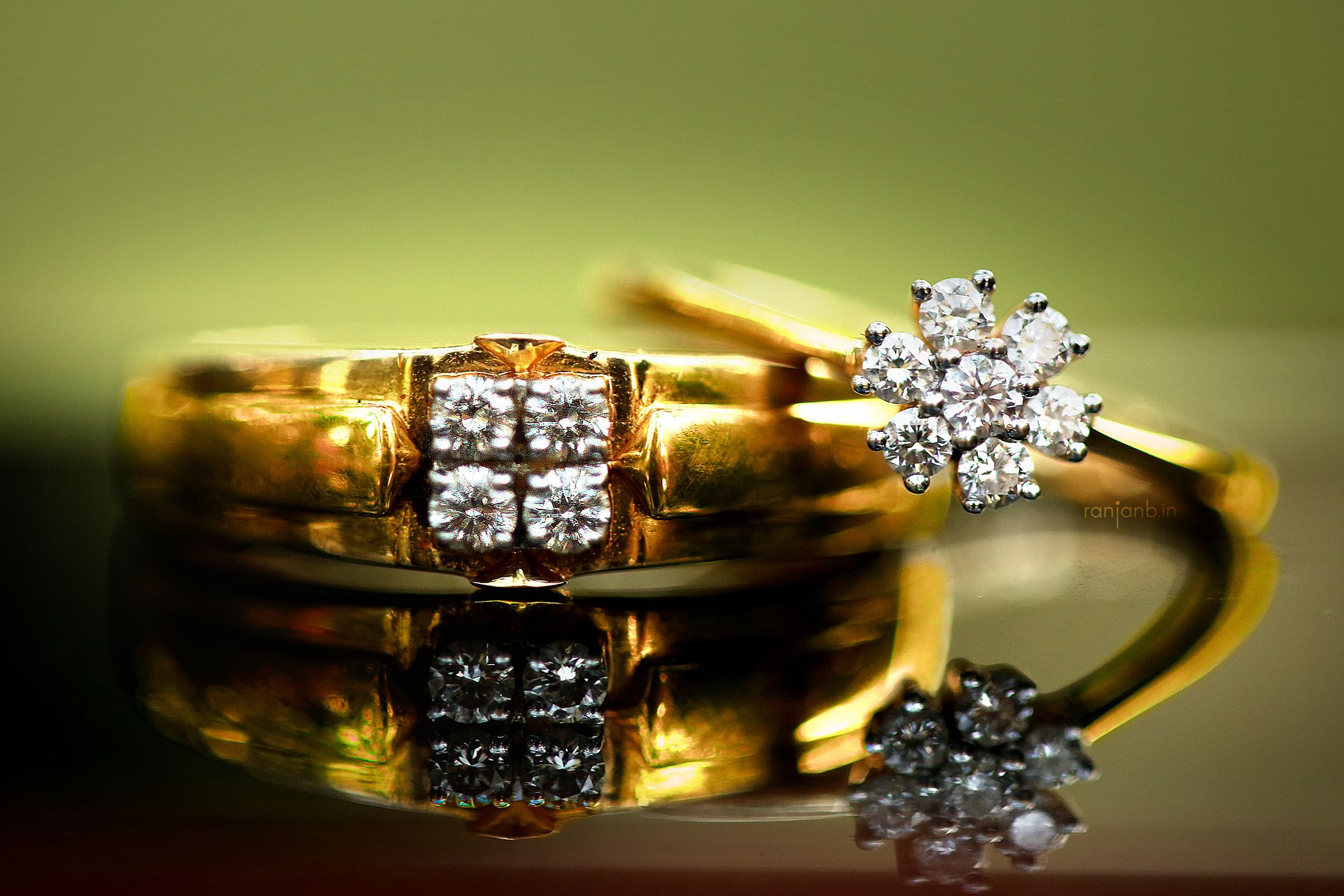 Macro shot of two wedding rings, showcasing intricate details, Close-up of bride and groom's wedding shoes, captured by Ranjan Bhattacharya.