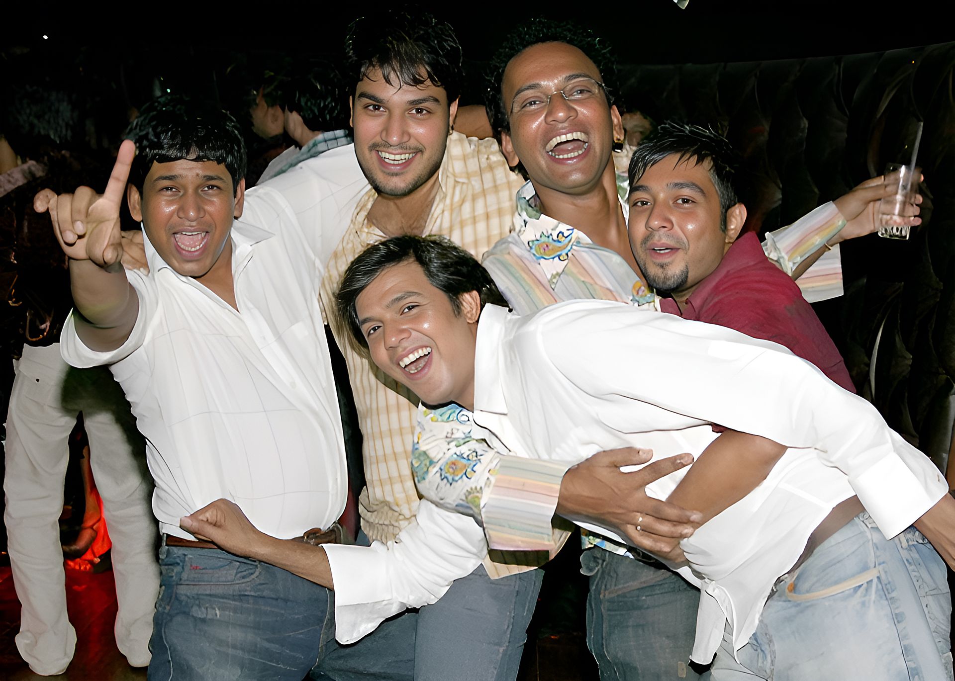 A nostalgic group photo from 2017 featuring Celebrity Photographer Debasish Mitra, Celebrity Makeup Artist Nanda Majumder, Event Manager Sanju Bijay, and Celebrity Fashion Stylist Anupam Chatterjee celebrating together.