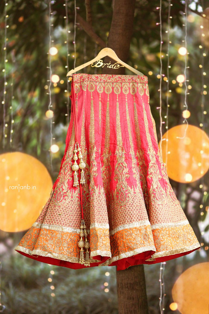 Lehenga hanging in an outdoor garden, captured by Ranjan Bhattacharya